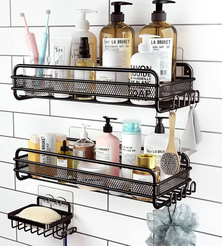 Bathroom items on a shower caddy shelf.