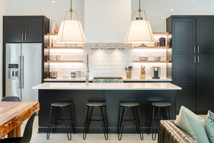 Contemporary kitchen remodel with lighting underneath the open shelving.