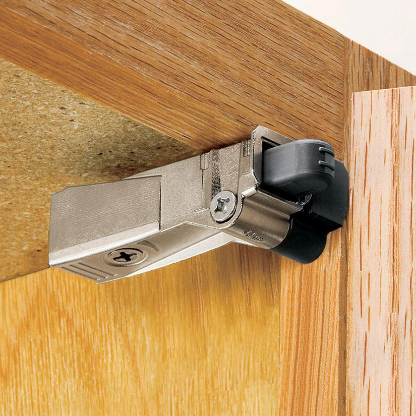 A damper or small plunger can add soft-close functionality to a cabinet without replacing the hinges.