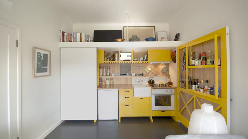 Cairo kitchen with bright yellow cabinets