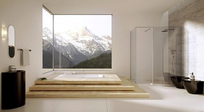 Floor-to-ceiling corner master bath windows with a mountain view.