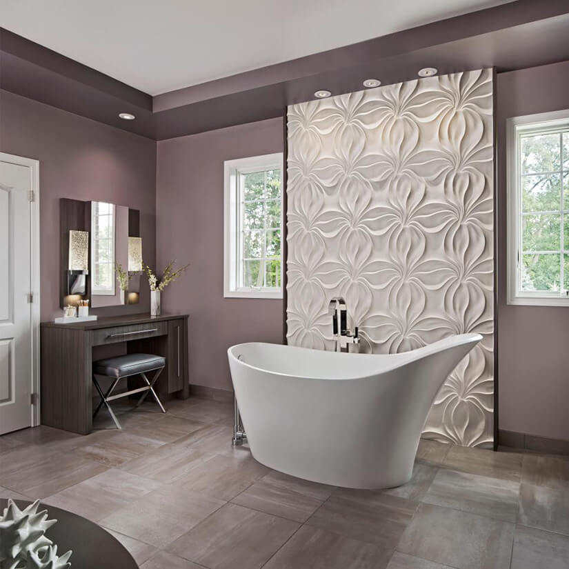 Freestanding tub with back support in a lavender master bathroom.