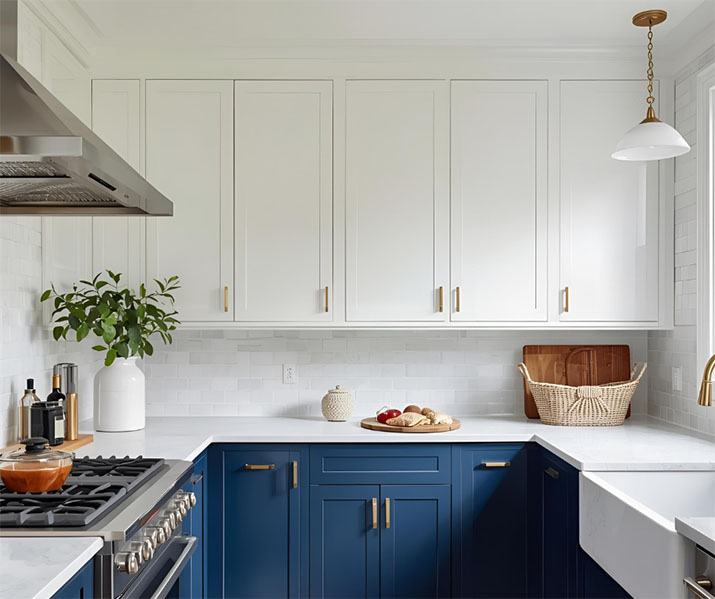A refreshing white and navy blue kitchen.
