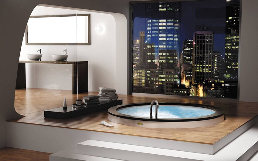 Enjoy a city view from the tub in this glamorous bathroom.