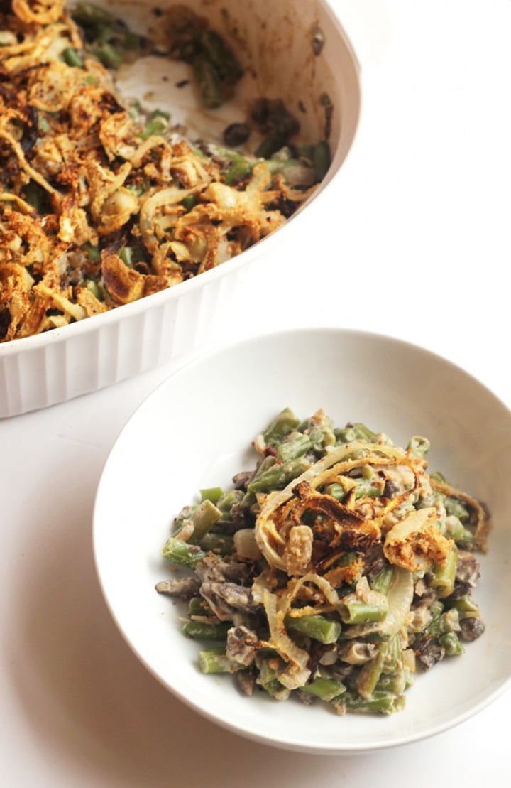 Green bean casserole in white dish and white bowl