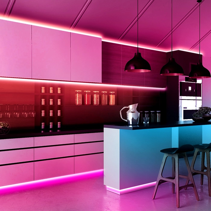 Modern kitchen with purple LED strip lighting above and below cabinets.
