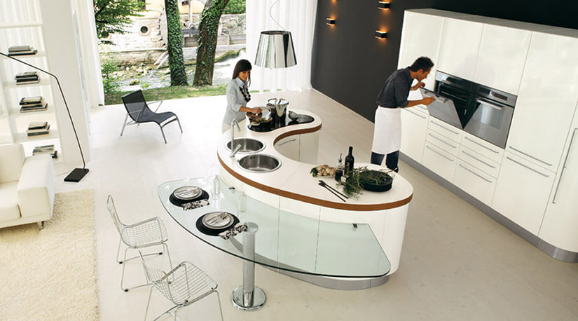 Modern curved custom kitchen island with glass breakfast bar
