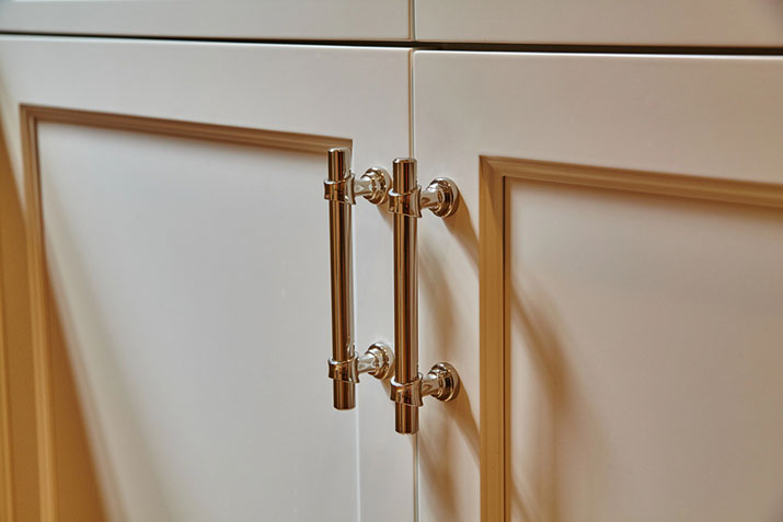 After cabinet hardware change on doors, attractive metal finish.