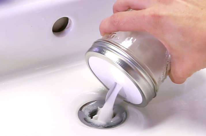 Pour the baking soda and salt mixture down the sink drain.