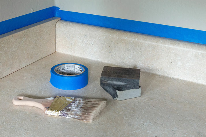 Prepping materials to paint laminate countertops.