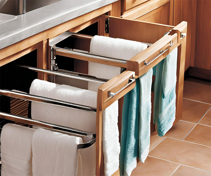 Towels on racks pulled out of drawers.