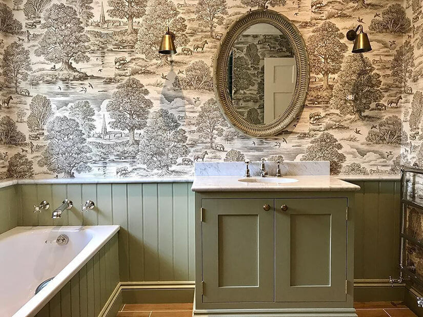 Bathroom wallpaper with a traditional woodland scene in white and brown.