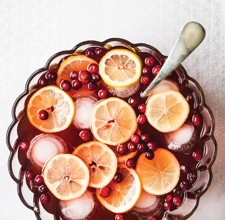 Punch bowl, lemon wheels, cranberries