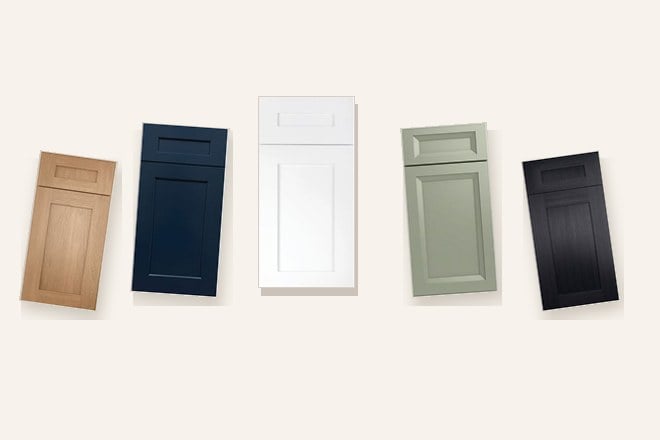 Five full-size cabinet door samples fanned out in oak, navy, white, sage and black