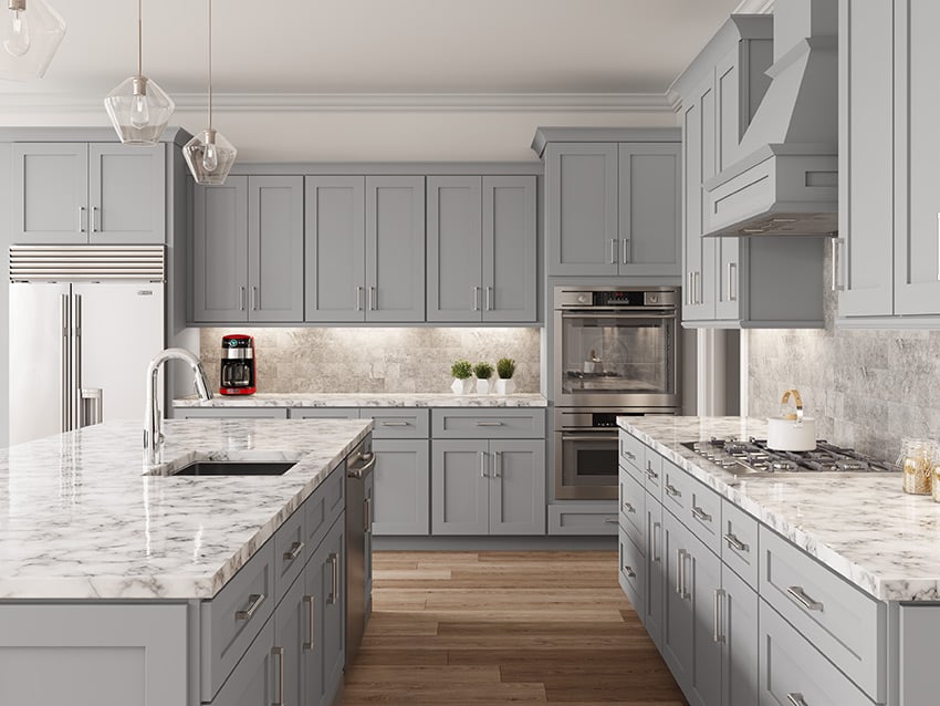 Lait Gray cabinets with a marble island and stainless appliances