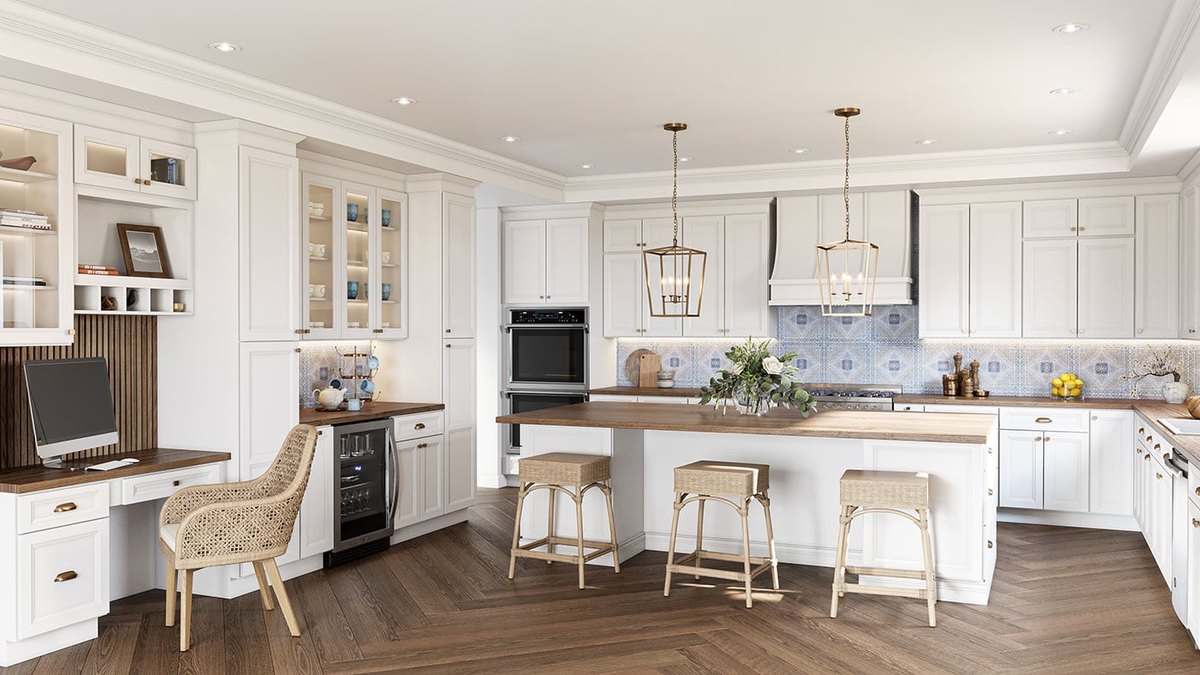 Oxford White cabinets with a wood topped island and a home office nook