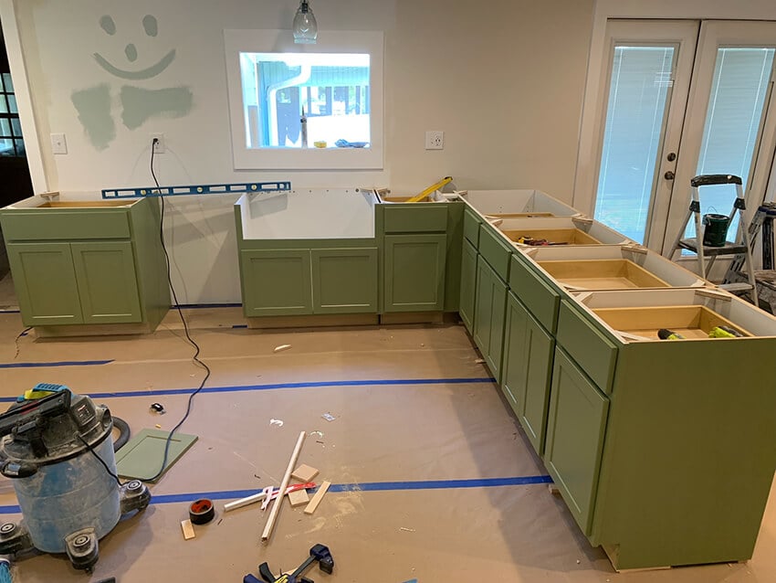 Patton Laurel green base cabinets during installation
