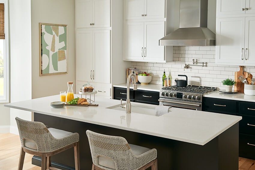Patton Midnight island with a white quartz top and white upper cabinets