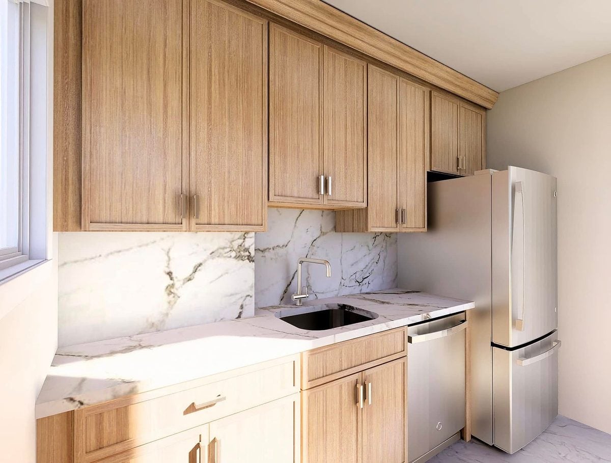 Petit Sand wall and base cabinets around a sink with a marble backsplash