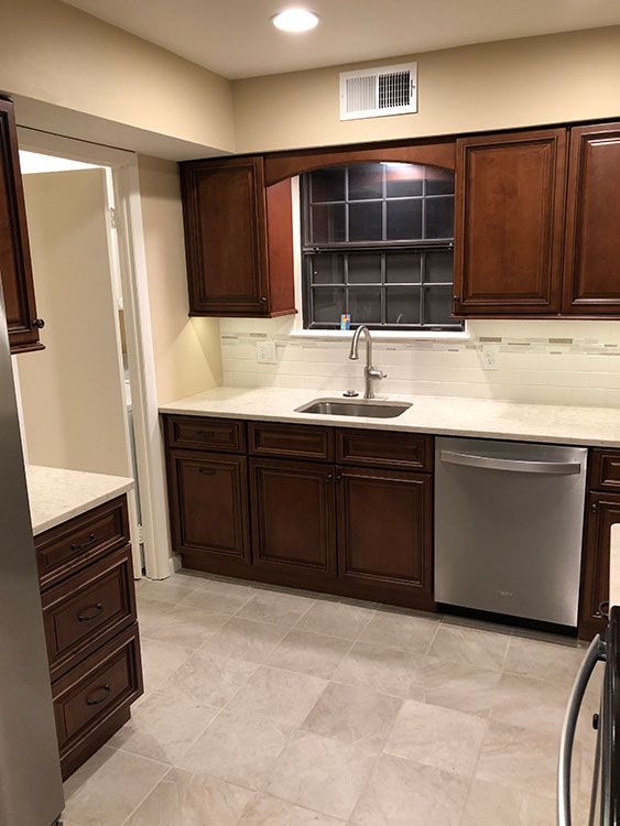 Michelle G.’s kitchen after, with Brownstone cabinets