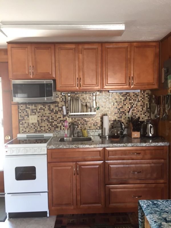 Irina S.’s kitchen after, with Cinnamon Glaze cabinets