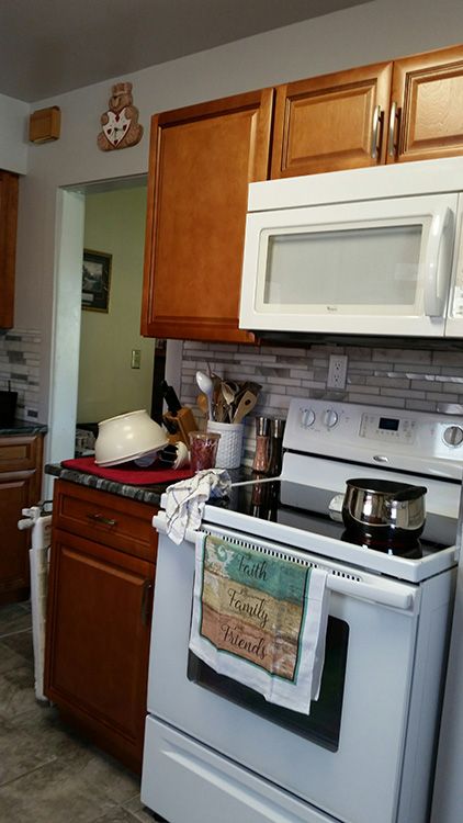 Debra P.’s kitchen after, with Cinnamon Glaze cabinets