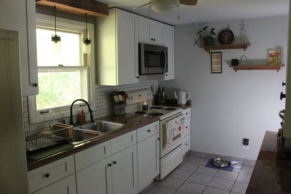Christopher M.’s kitchen after, with Ice White Shaker cabinets