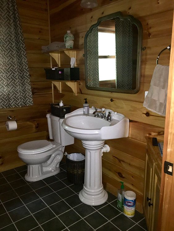 Kathryn W.’s bathroom before new cabinets