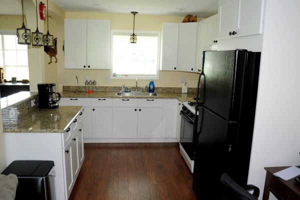 Mike W.’s kitchen after, with Ice White Shaker cabinets