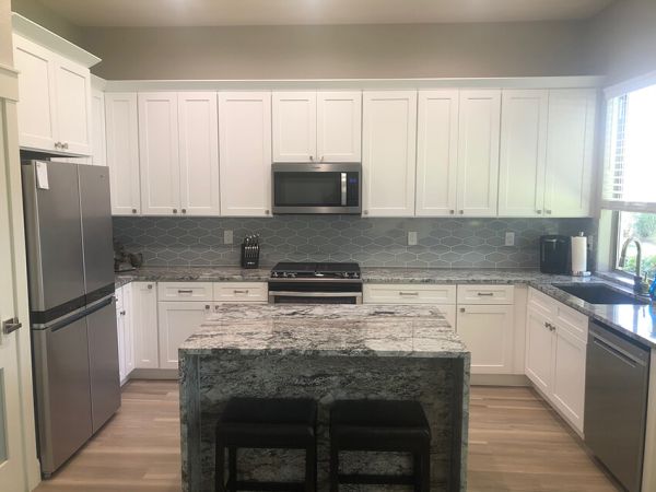 James W.’s kitchen after, with Shaker Arctic cabinets