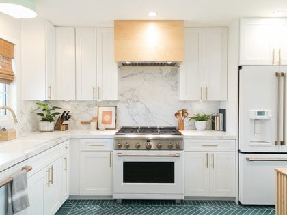 A kitchen in shaker kitchen cabinets