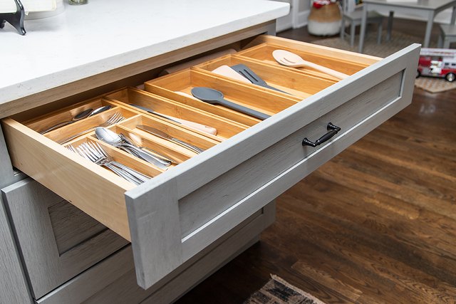 A Nova Light Gray drawer pulled all the way out on its full-extension glides