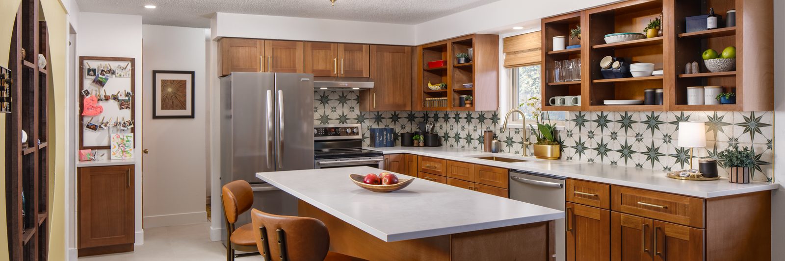 Woodland Brown Shaker kitchen cabinets with open shelves, a star tile backsplash, and a white island