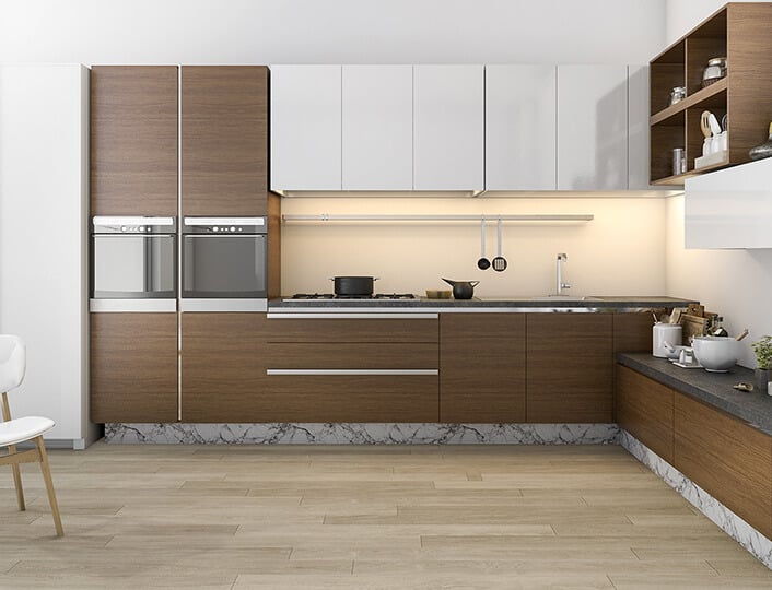 L shaped kitchen with warm brown bamboo cabinets and minimal hardware.