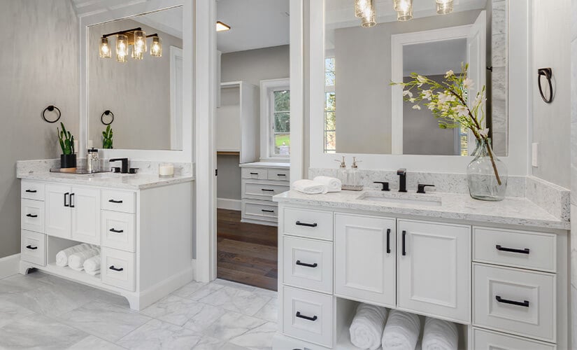 Bathroom cabinet ideas with separate white his and her vanities.