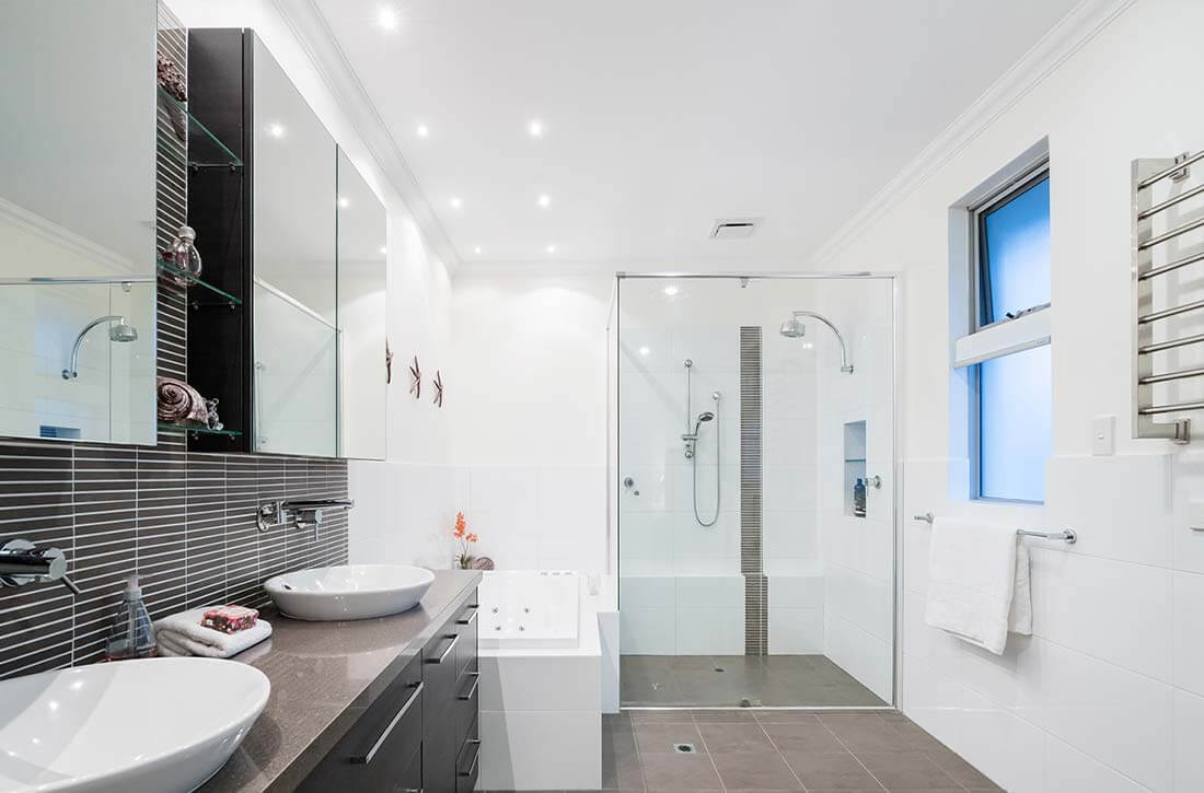 Modern bathroom with recessed lights.