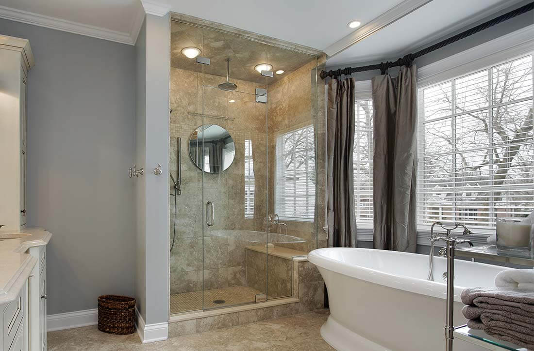 Traditional style bathroom with shower lighting.