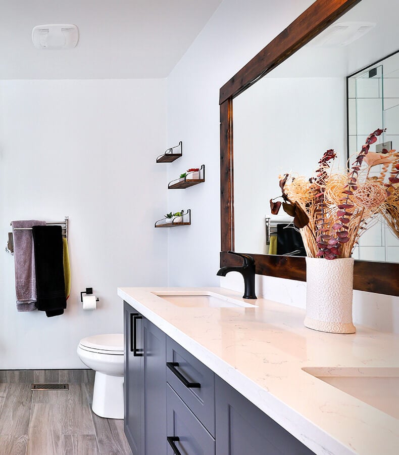 Organic bathroom with matte black fixtures and hardware.