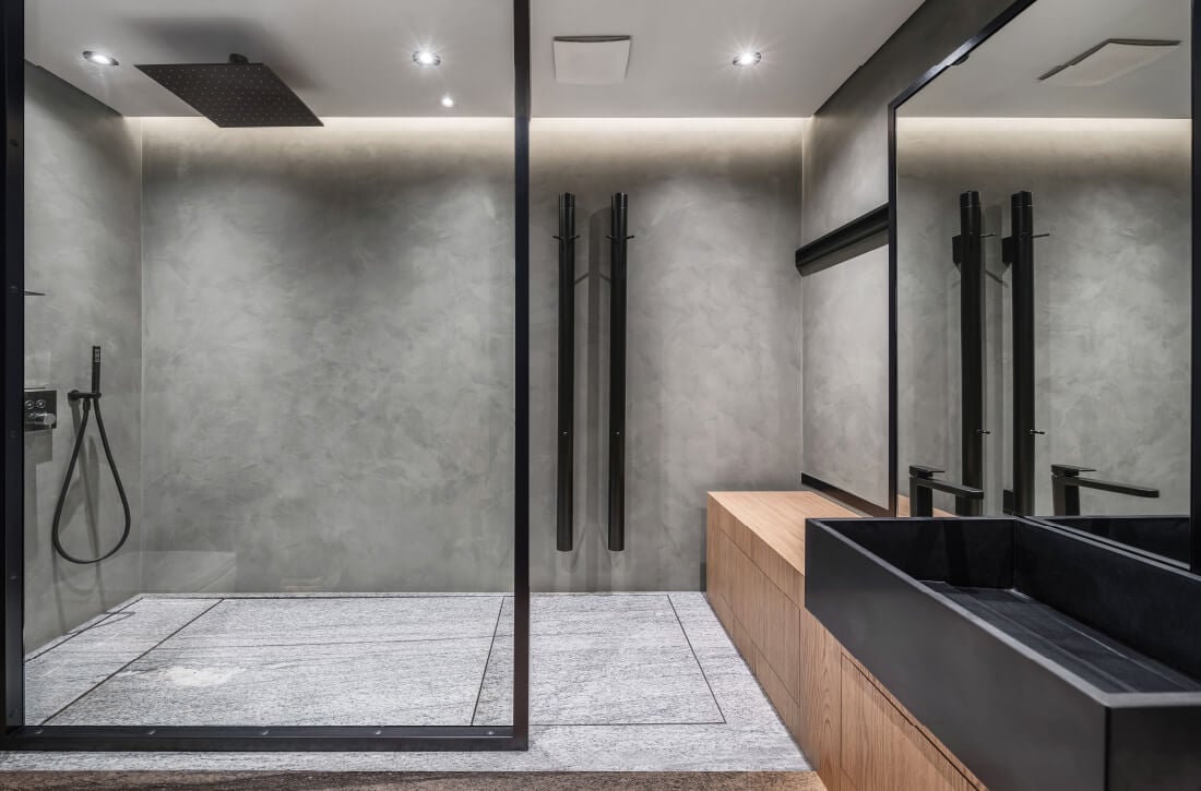 Modern bathroom with large open concept shower.