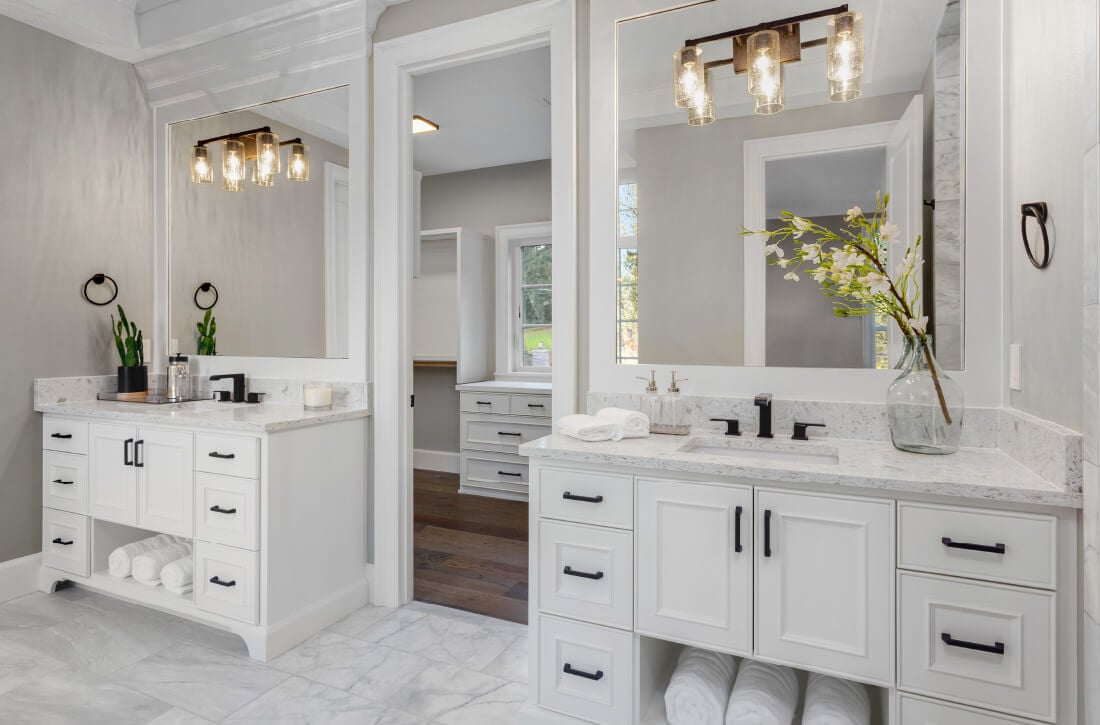 Bathroom with separate his and her vanities.