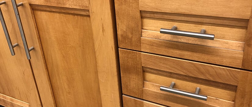 Close up of wood kitchen cabinets