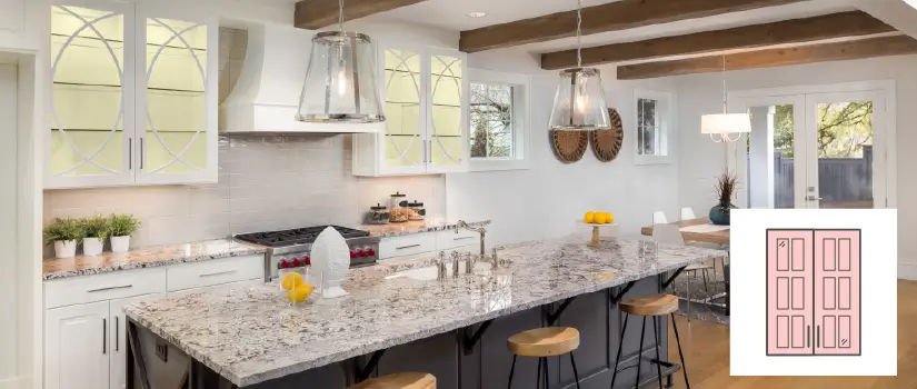 Kitchen with granite countertops, long island and white open frame cabinets with overlapping half circle details.