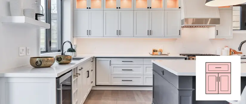 White shaker cabinets with black modern hardware.