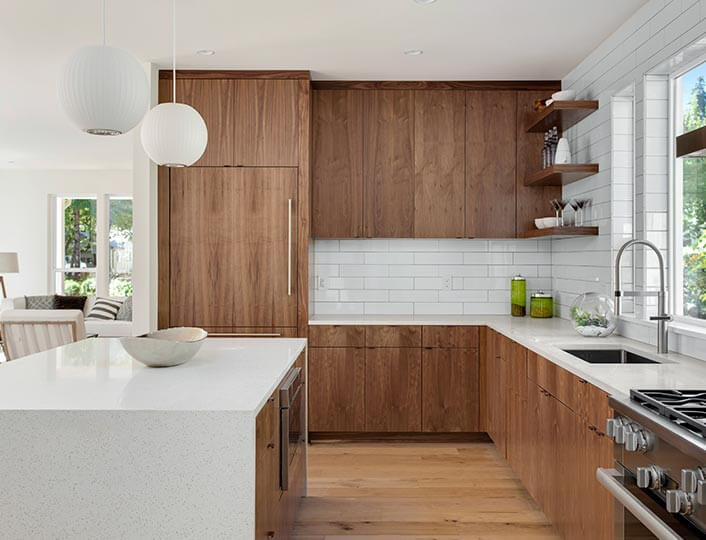 Open concept kitchen brown cherry cabinets