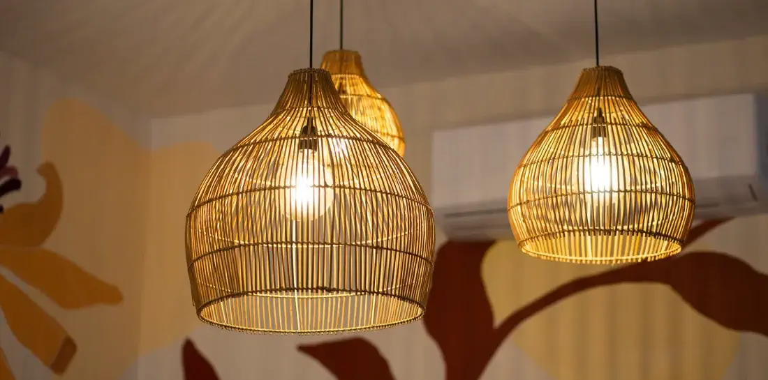 Three basket pendant lights hanging from the ceiling.
