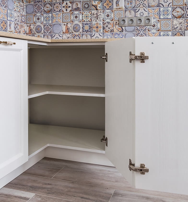 White accordion cabinets with silver hardware.