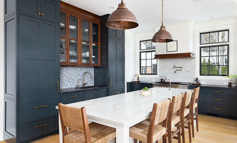 Kitchen with navy blue cabinets.