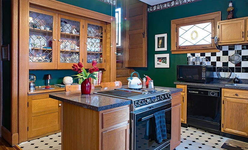  Vintage craftsman kitchen with built-in china hutch.