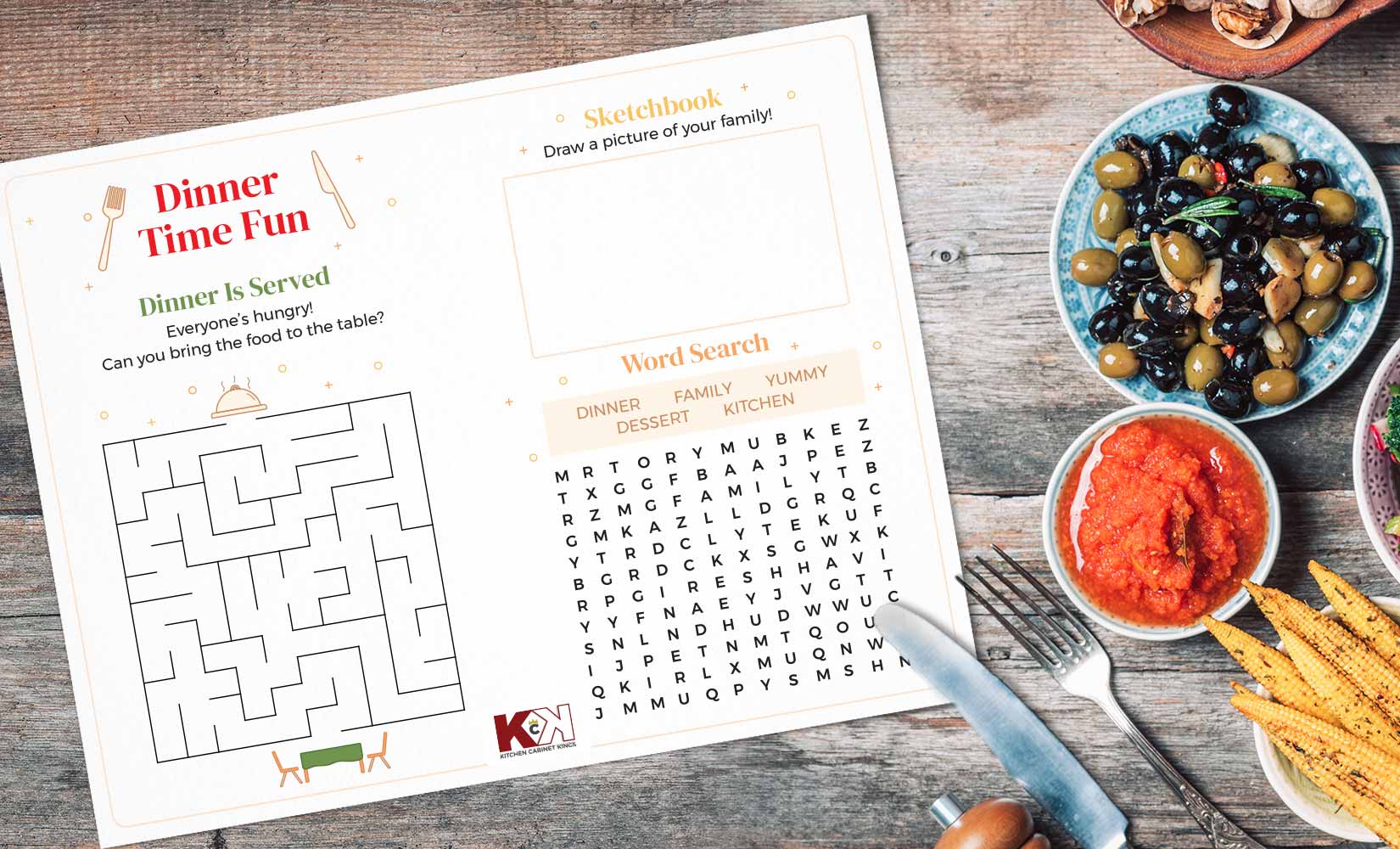 Fun dinner table placemat with maze, word search, and drawing section next to served food