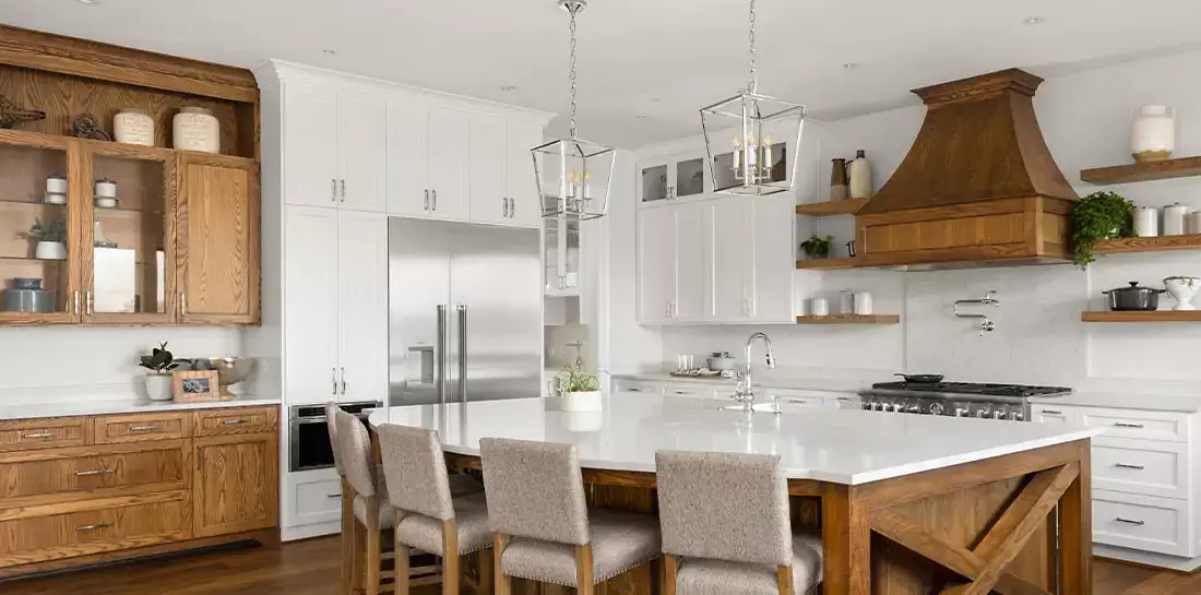 Glass cabinets mixed with white kitchen cabinets and natural wood materials.